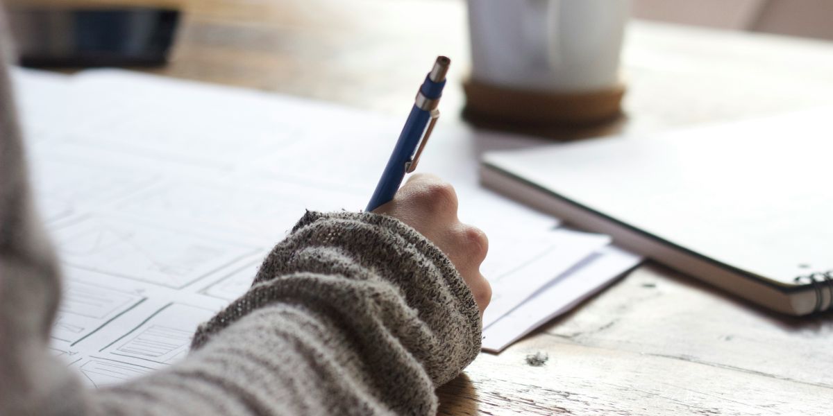 writing at desk